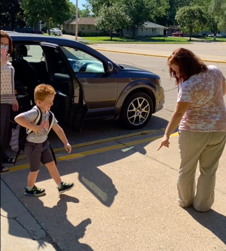  Parent dropping child off at preschool